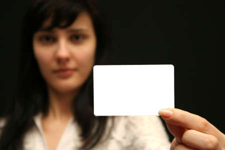 The woman with an empty visiting cardの写真素材