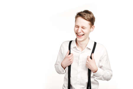 young man in glasses surprises and shock on white backgroundの写真素材