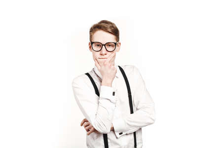 young man in glasses surprises and shock on white backgroundの写真素材