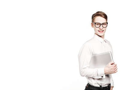 young man in glasses with laptop with emotion on white background