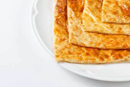 georgian traditional khachapuri on plate on white background. Asian national mealの写真素材