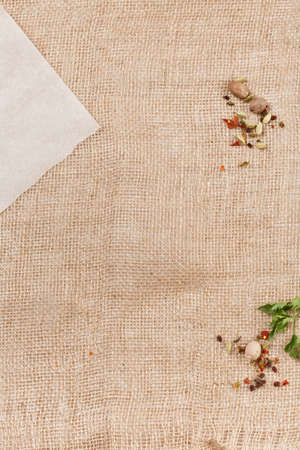 canvas background with blank paper and spicesの写真素材