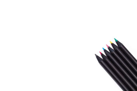 twelve black parallel pencils stay together on white background. close-up view. isolated imageの写真素材