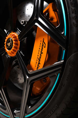 Dubai / UAE - December 19 2019: Close-up brakes support of Lamborghini Aventador SV Roadster....