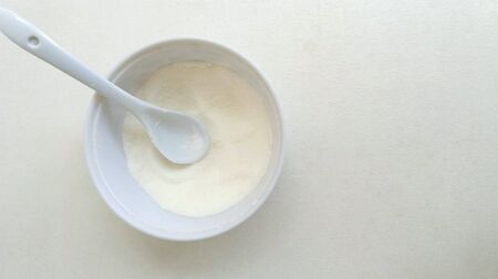 White plastic bowl with sugarの素材