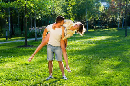 Weekend in the park. Happy couple on vacation. Lovers on a walk.の写真素材