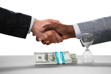 Businessmen shake hands. A deal made. No way back now. Friendship of countries.の写真素材