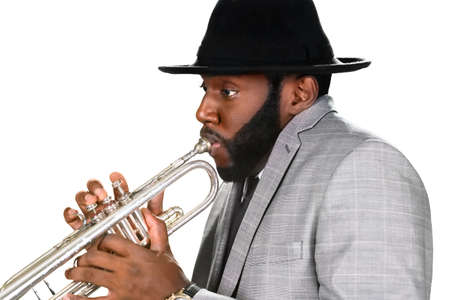 Expression of skill. Trumpeter in a hat. Classy trumpeter performing. Don't distract the trumpeter.
