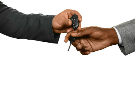 Man handing keys. Just take my car. A test-drive. A sign of trust.の写真素材