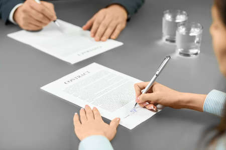 Employer and worker sign contracts. An important step. Common goals build good progress. The decision is yours.の写真素材