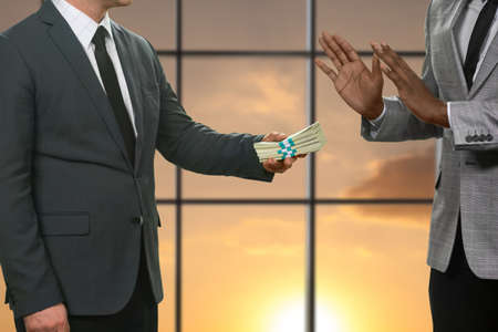 Manager rejects money in office.の写真素材