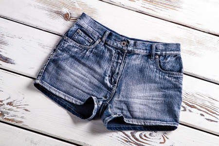 Woman's new jeans shorts. New jeans shorts on showcase. Vintage jeans shorts for ladies. Short shorts for women.の写真素材