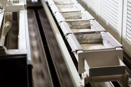 Conveyor with the flour. Production of flour. Bakery plant.