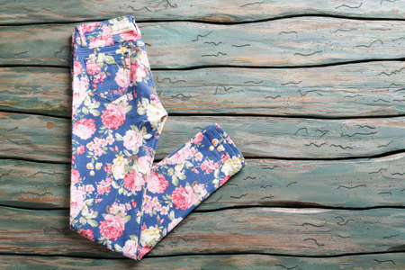 Blue trousers with floral print.の写真素材