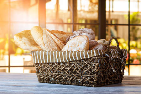 Basket filled with bread.の写真素材