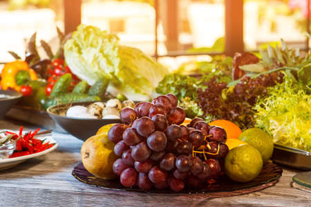 Grape and lime on plate.の写真素材