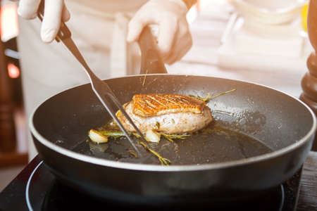 Chef is preparing duck steak.の写真素材