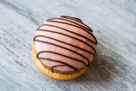 Top view of glazed biscuit. Cookie sandwich on gray background. Bush cake with great flavor. Sweet...