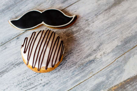 Cookies with glaze. Sweets on gray background. Buy one and get two. Sweet flavor and original...