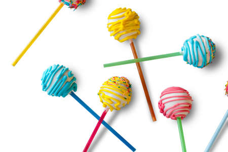 Bright sweets on sticks. Candies on white background. Tasty cake pops. Easy way to surprise...