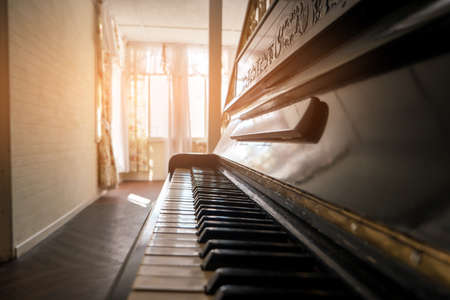 Side view of piano. Musical instrument indoors. Music of our life. Find tranquility and inspiration.の写真素材