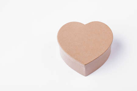 Heart shaped gift box isolated. Cardboard heart shaped gift box. Handmade present box. Present good emotions.の写真素材
