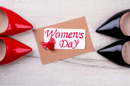 Greeting card, bow tie, heart. Women`s Day card with heart. Psesent shoes and greeting card. Wishes...