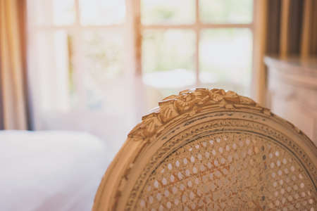 Part of a wooden chair. Ornament on wood. Classics never gets old.の写真素材