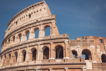 Colosseum on sky background. Arches and walls. Beauty of the old world.の写真素材