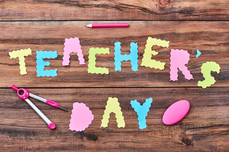 Paper letters, pencil, eraser. Teachers Day is autumn holiday.の写真素材