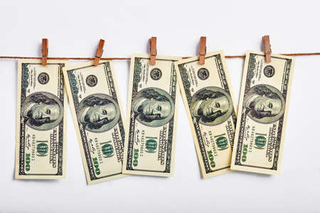 Dollars hanging on a rope. Money and abundance.