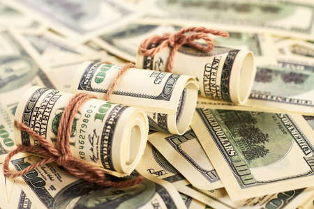 American dollars in rolls. Saving money for charity.の写真素材