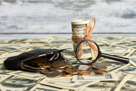 Dollars on wooden surface. Companys growth concept.の写真素材