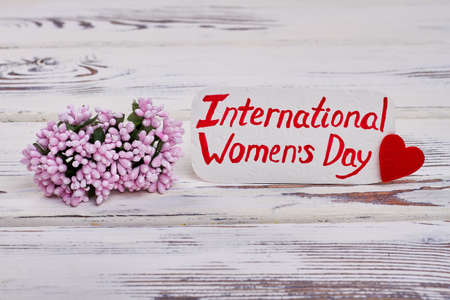 Flowers and card. Happy international womens day.の写真素材