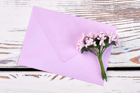 Envelope and bunch of flowers. Love confession letter.の写真素材