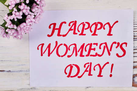 Bunch of flowers and card. Top gifts for her.
