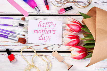 Flowers and set of cosmetics. Present for beloved mother.の写真素材