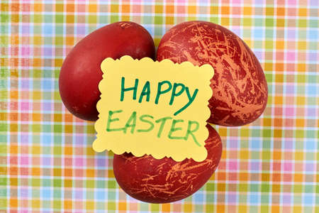 Red dyed eggs. Easter handmade card. Common Easter attributes.