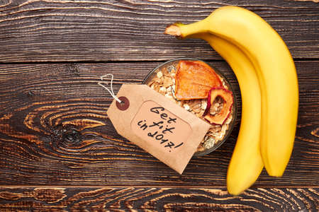 Bananas and portion of muesli. Staying healthy with nutrition.の写真素材
