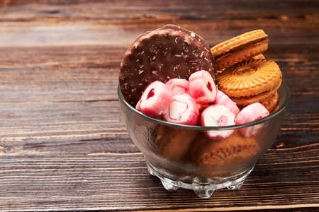 Cookies on wooden surface. Enjoy sweet life.の写真素材