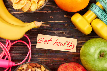 Skipping rope, apple and dumbbells. Start new habits.の写真素材