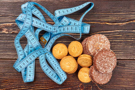Cookies on wooden background. Take control of your life.の写真素材