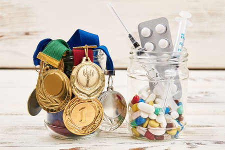 Syringes, medals and pills. Improvement of sports results.の写真素材