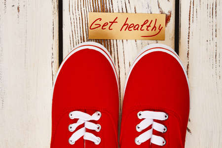 Gumshoes and motivation card. The best walking workouts.の写真素材