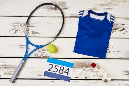 Badminton racket and T-shirt. Physical activity as a lifestyle.の写真素材