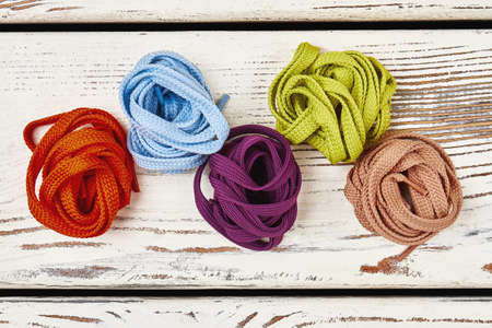 Set of coloured shoelaces. Bright idea for leisure.の写真素材