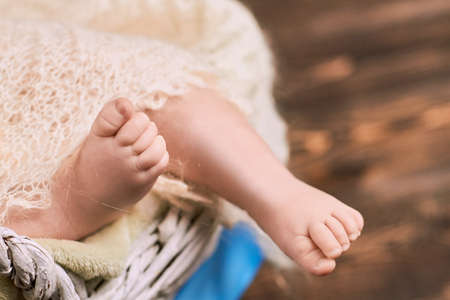 Baby feet close up. Legs of an infant. First year of life.の写真素材