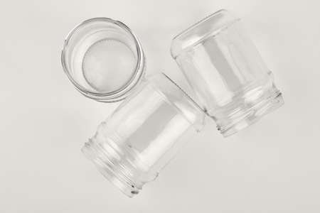 Closeup glassware containers, white background. Group of flass vessels.の写真素材