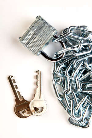 Closeup of iron chain with padlock. Iron security equipment, top view.
