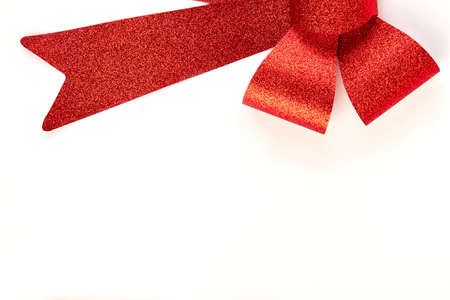 Cropped image of red bow. Half of bow, white background.の写真素材